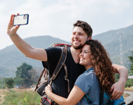 Couple hiking taking selfie